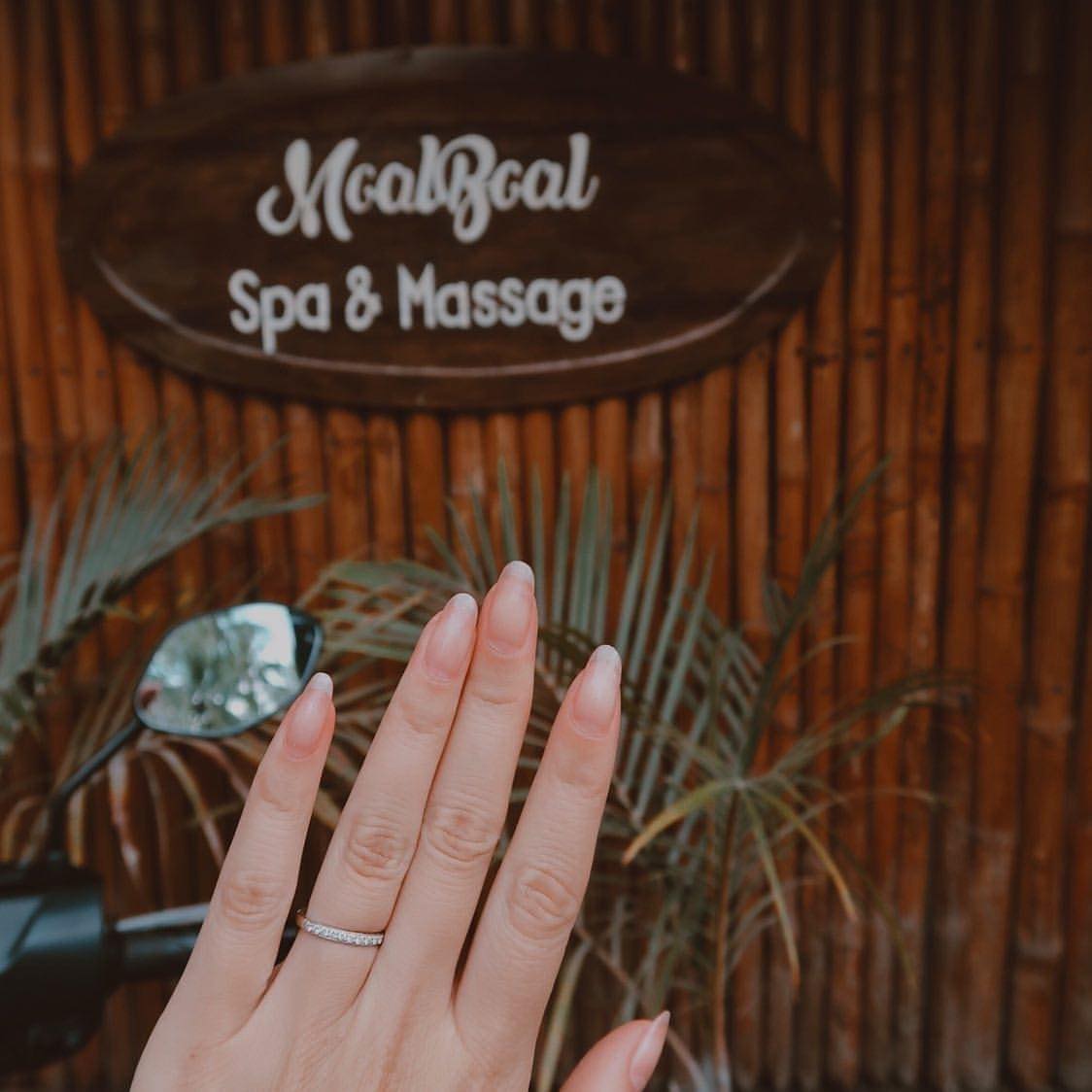 The Moalboal Spa & Massage sign on the bamboo facade